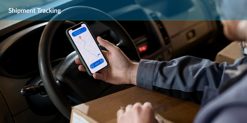 Shipment tracking : A person checks the status of their shipment on a mobile phone while sitting in their car.