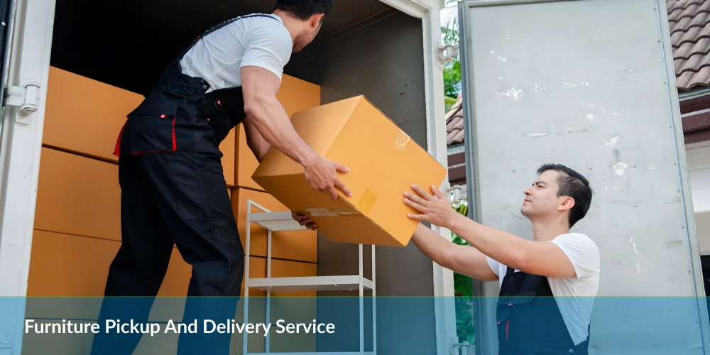 Two people loading a yellow box into a delivery truck with "Furniture Pickup And Delivery Service" text.