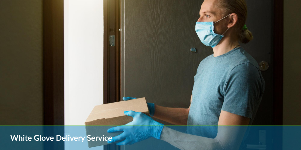 Delivery person in blue gloves holding a package at a doorstep.