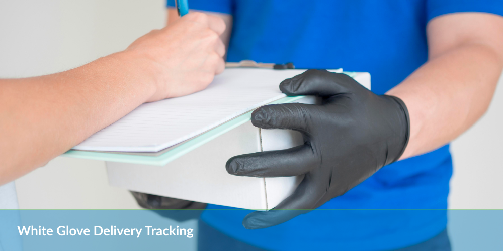 Person signing for a delivery while delivery worker in gloves holds a package and clipboard.