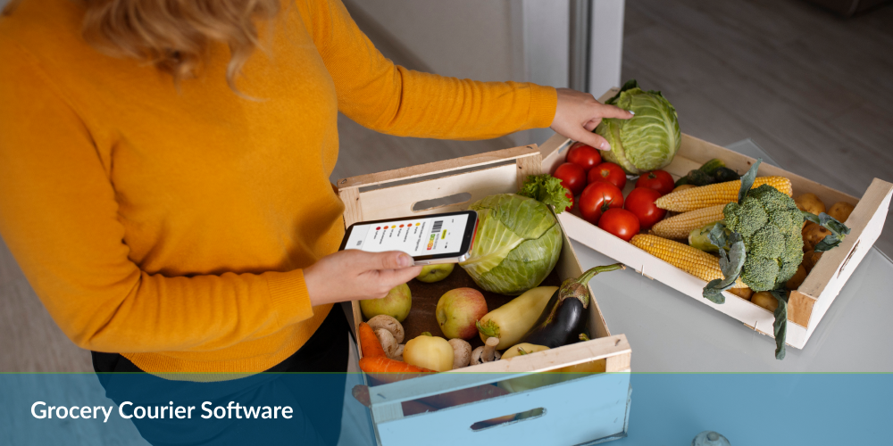 Grocery courier software: Person using a phone with grocery app next to crates of fresh produce.