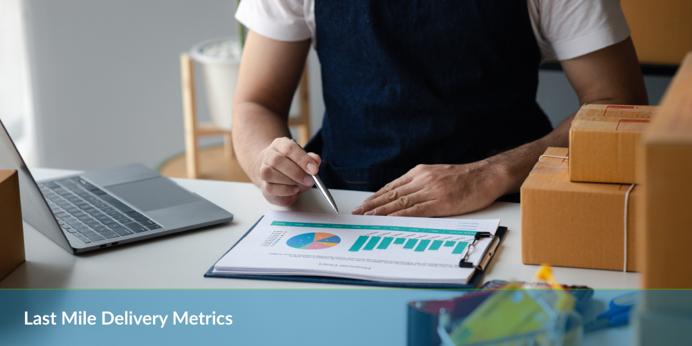 Last Mile Delivery Metrics: Person analyzing delivery metrics on a chart with packages and a laptop on the desk.