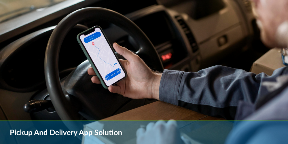 Driver in vehicle holding smartphone with navigation app, text reads "Pickup And Delivery App Solution".